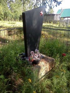 Братская могила 20 человек мирных жителей в Кельчиюре /  / Республика Коми